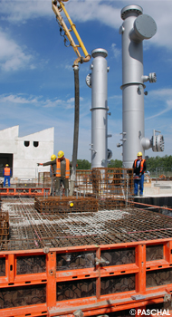 Complex foundations produced in multiple phases