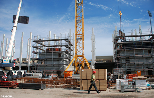 Moving formwork panels by crane