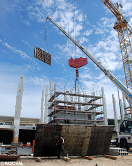 crane holding a combination of five formwork panels